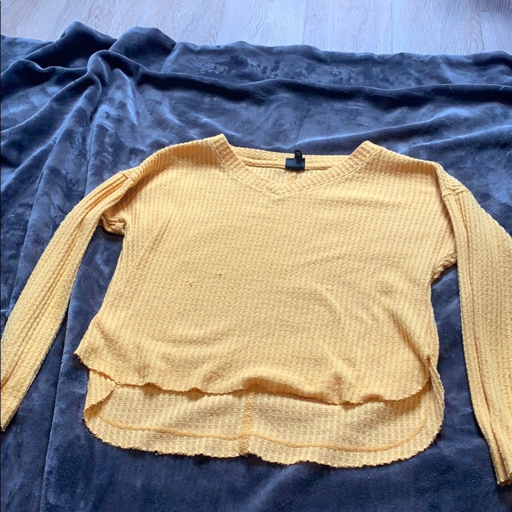 A yellow sweater